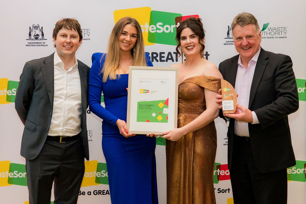 The Comms & Ed team and CEO Stuart Devenish with the WasteSorted Award